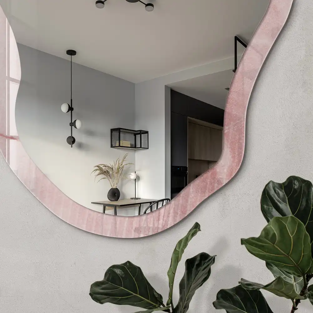 Miroir décoratif irrégulier avec impression de liens rosés
