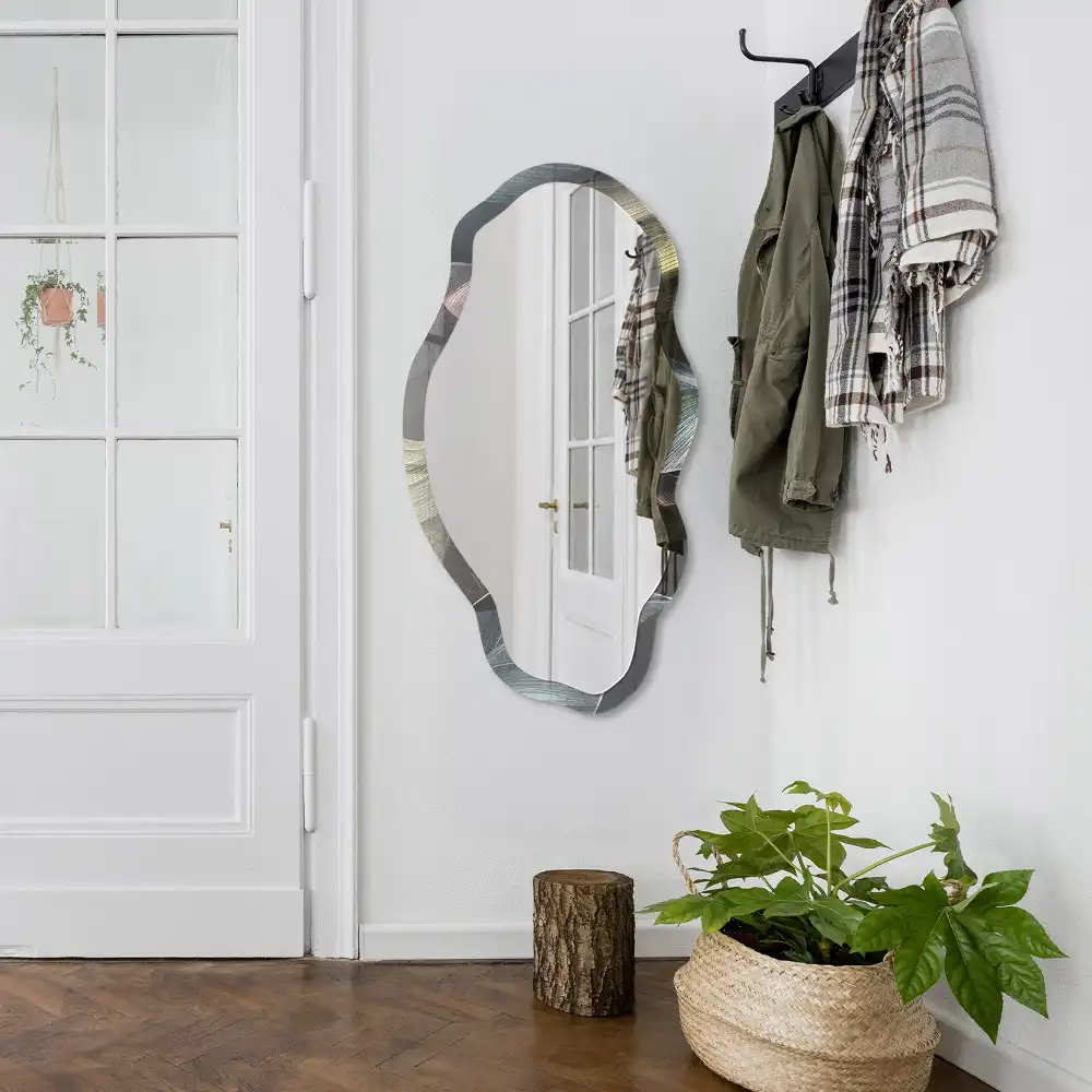 Miroir décoratif irrégulier à motif de feuilles tropicales
