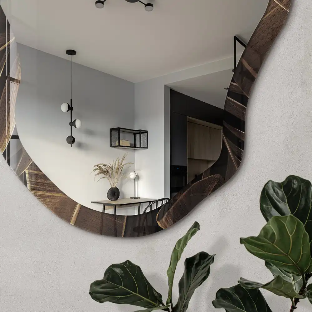 Miroir irrégulier avec motif de feuilles tropicales