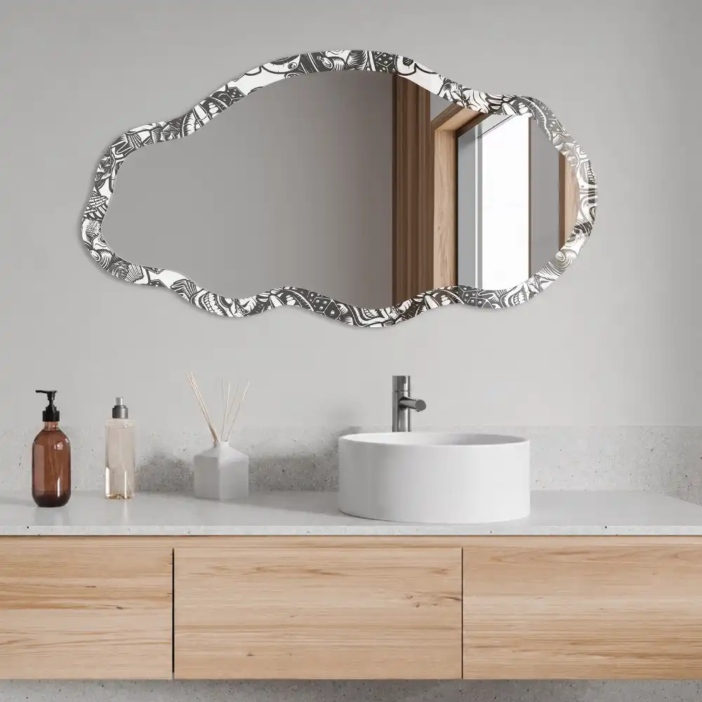 Miroir encadré à motif de visages expressifs aux formes irrégulières