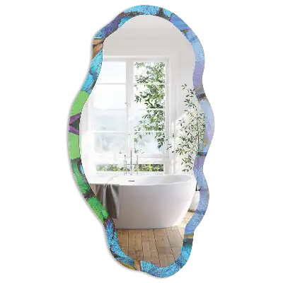 Miroir irrégulier avec motif papillon