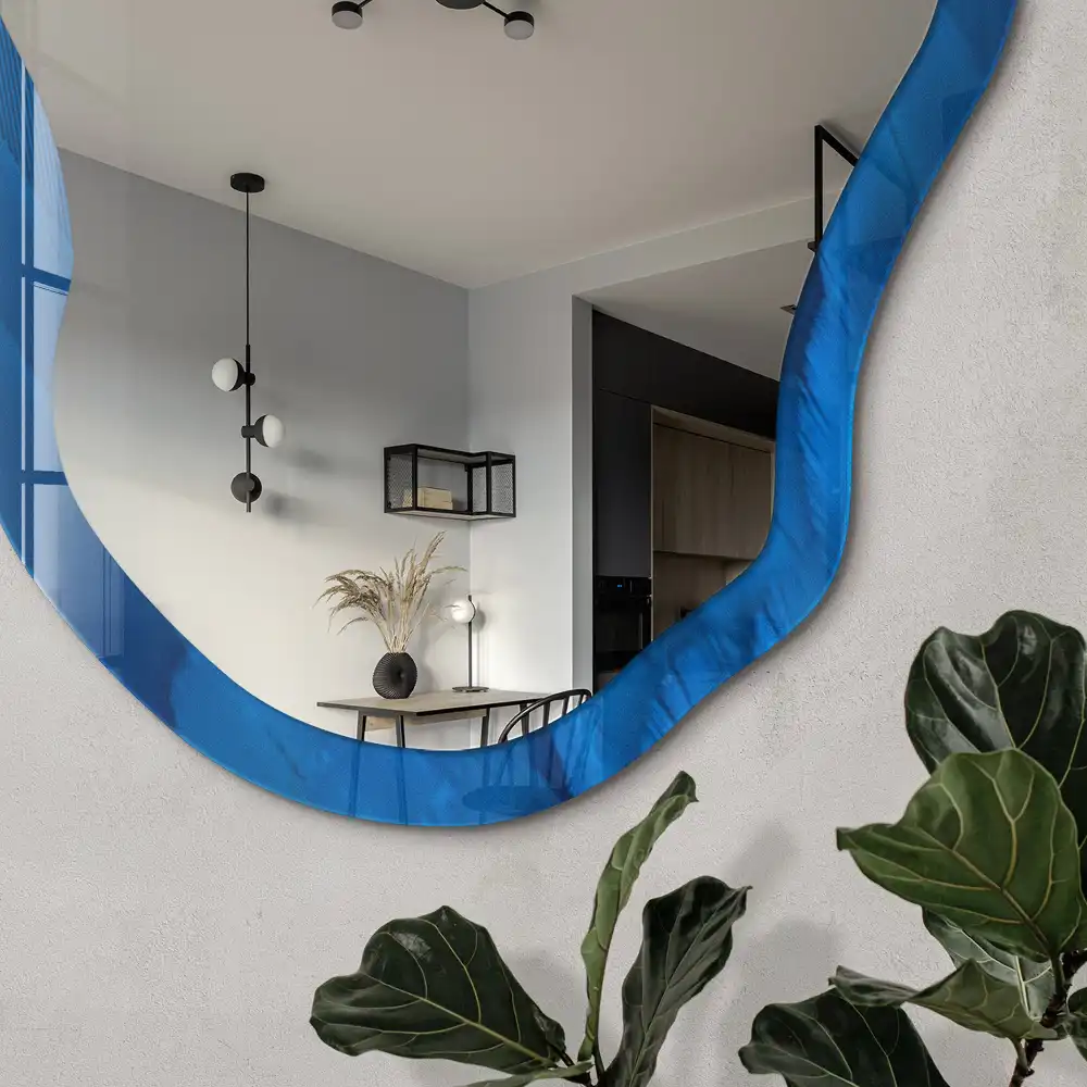 Miroir irrégulier à motif de plumes bleues