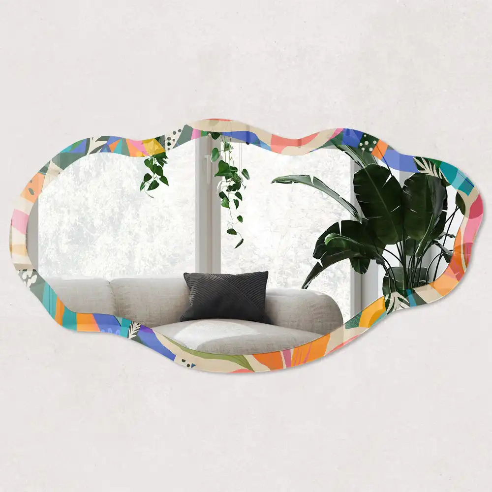 Miroir encadré à motif de feuilles exotiques aux formes irrégulières