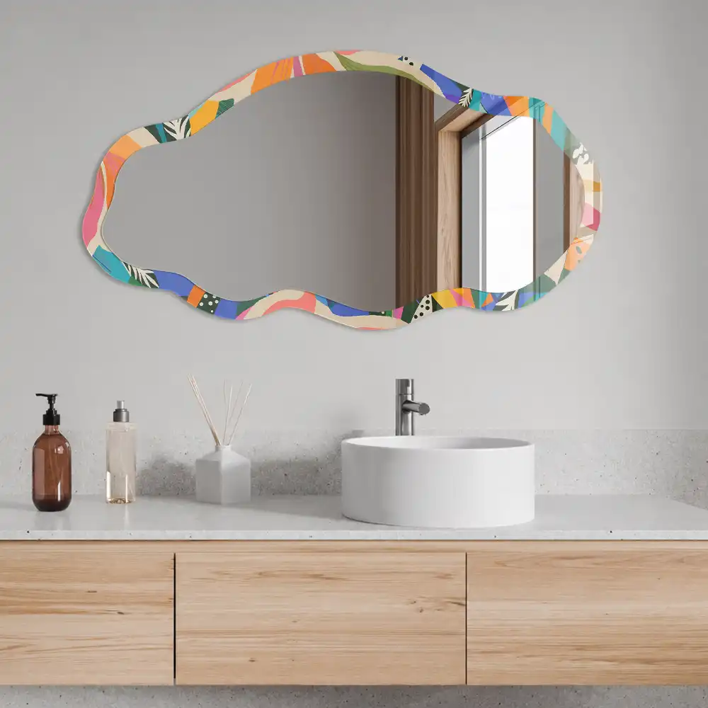 Miroir encadré à motif de feuilles exotiques aux formes irrégulières