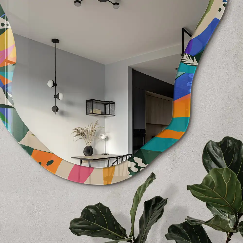 Miroir encadré à motif de feuilles exotiques aux formes irrégulières