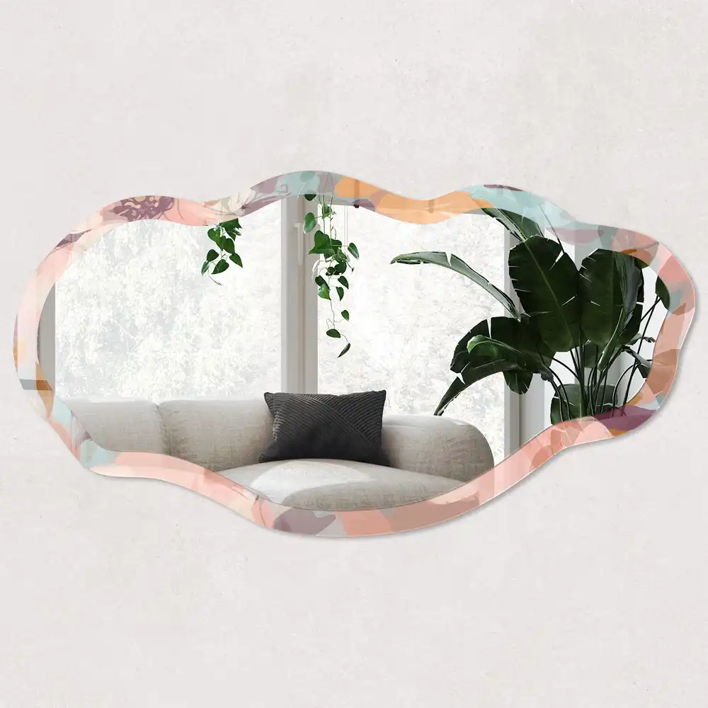 Miroir encadré à motif floral et forme irrégulière