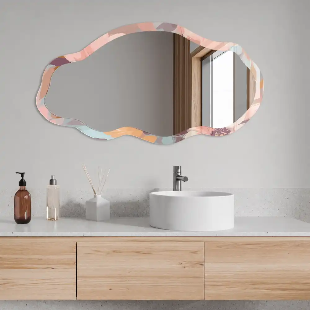 Miroir encadré à motif floral et forme irrégulière