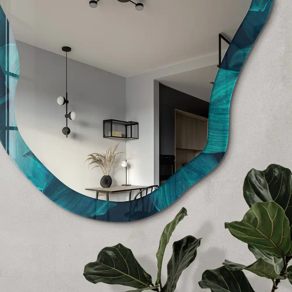 Miroir encadré à impression de feuilles turquoise forme irrégulière