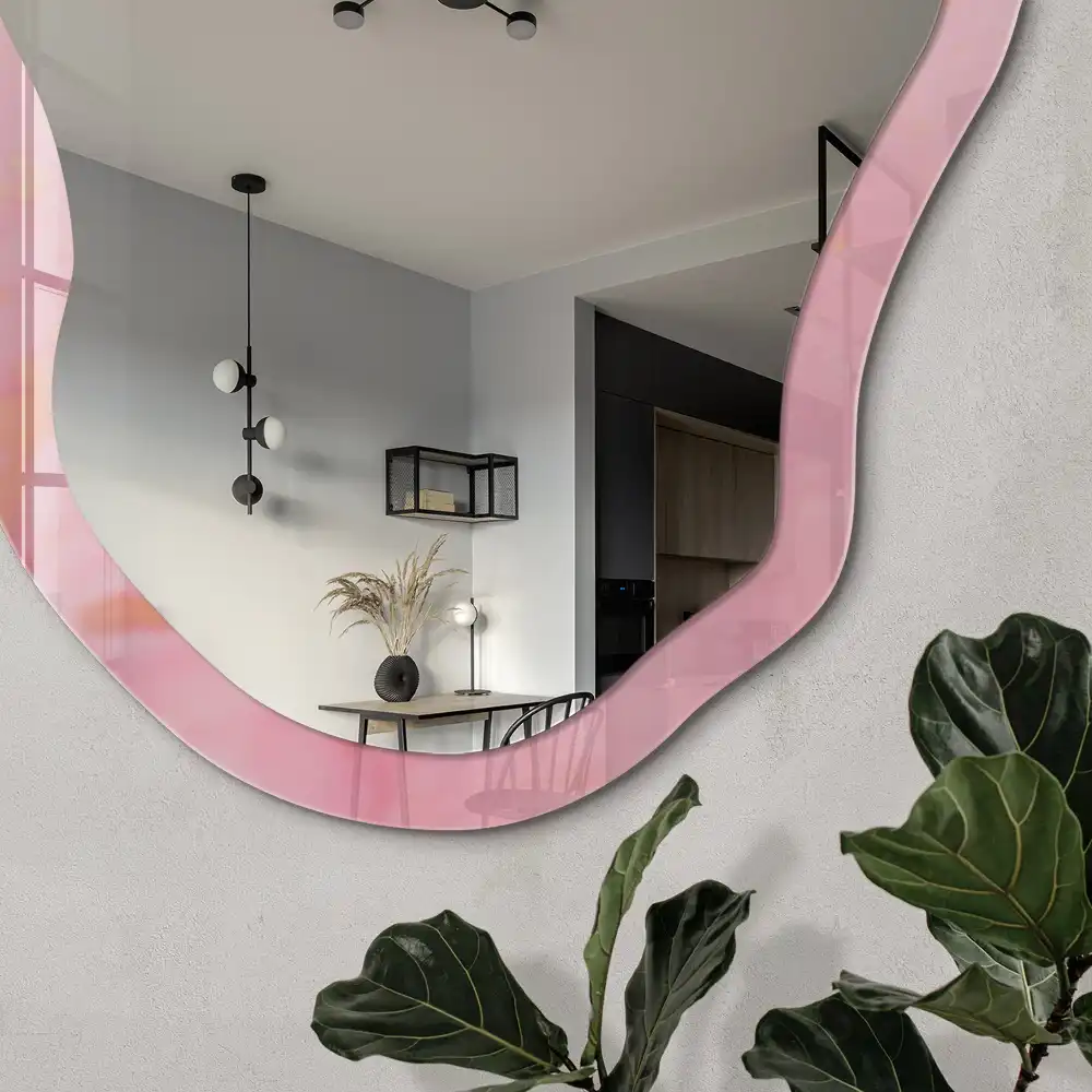 Miroir irrégulier avec impression rêve rose