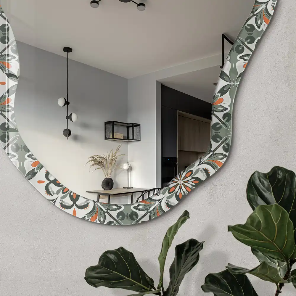 Miroir décoratif irrégulier à motif végétal doré