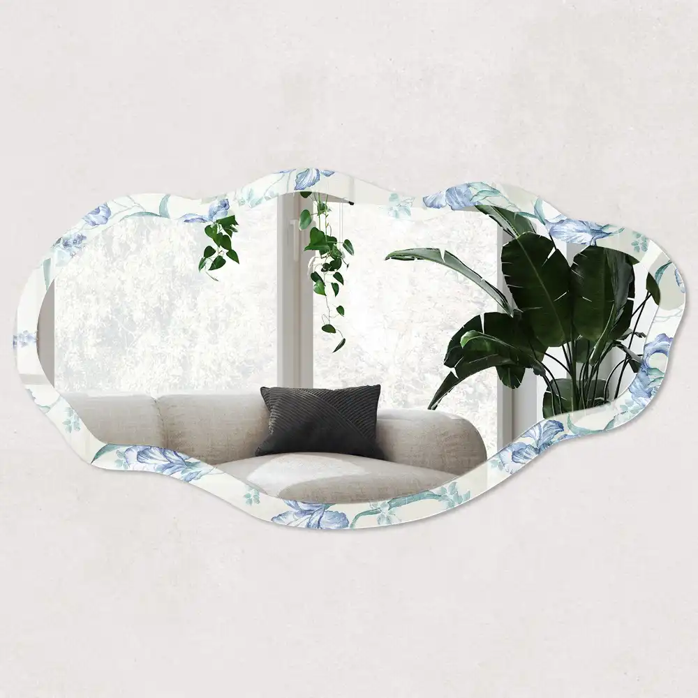 Miroir encadré à motif floral et forme irrégulière