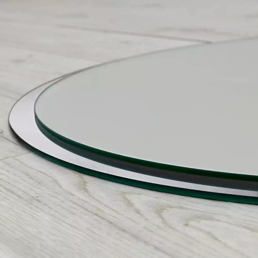 Miroir rond suspendu avec cadre blanc
