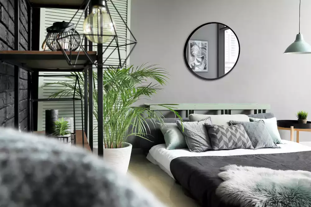 Miroir rond suspendu avec cadre noir