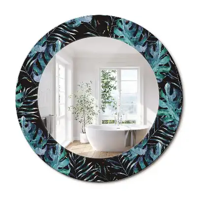Miroir rond avec décoration feuilles exotiques