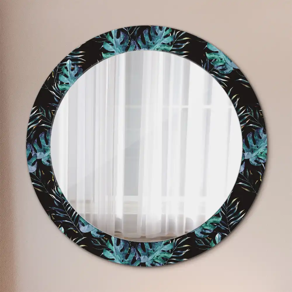 Miroir rond avec décoration feuilles exotiques