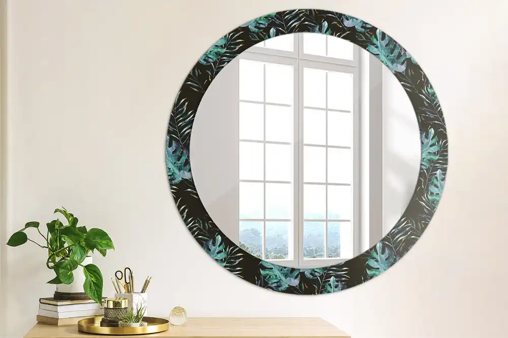 Miroir rond avec décoration feuilles exotiques