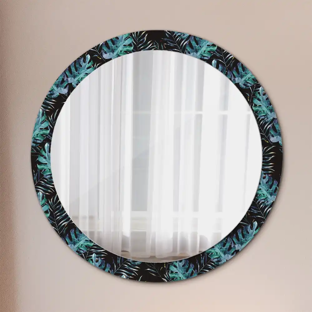 Miroir rond avec décoration feuilles exotiques