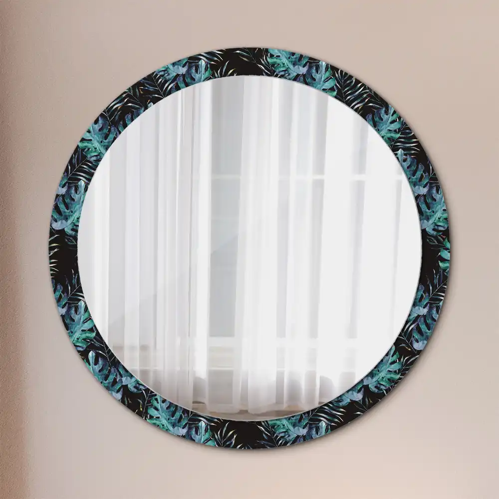 Miroir rond avec décoration feuilles exotiques