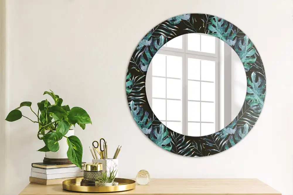Miroir rond avec décoration feuilles exotiques