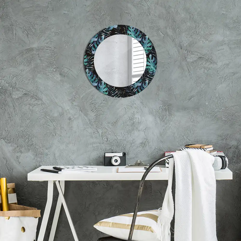 Miroir rond avec décoration feuilles exotiques