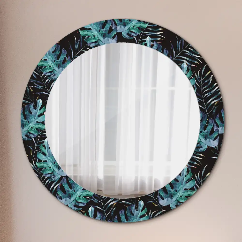 Miroir rond avec décoration feuilles exotiques