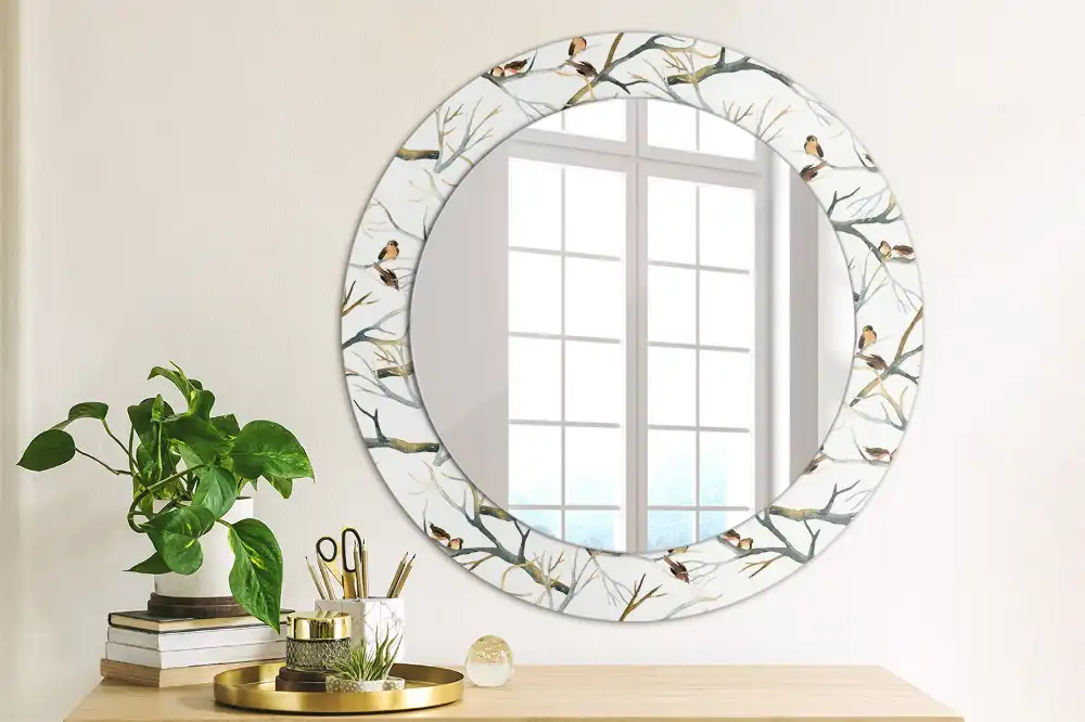 Miroir rond avec décoration moineaux sur des branches