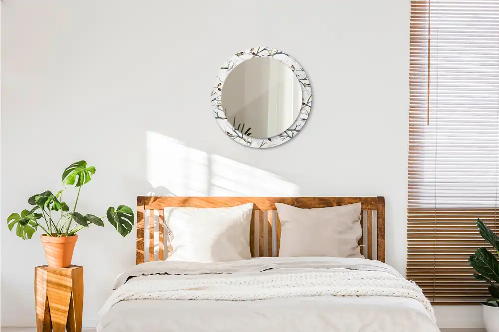 Miroir rond avec décoration moineaux sur des branches