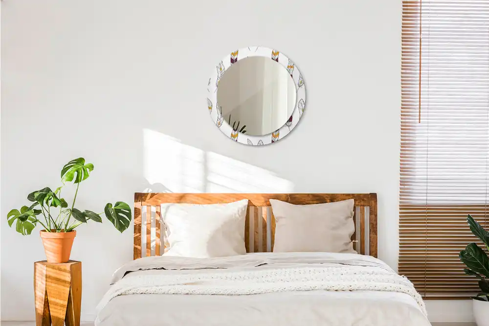 Miroir rond avec décoration plumes