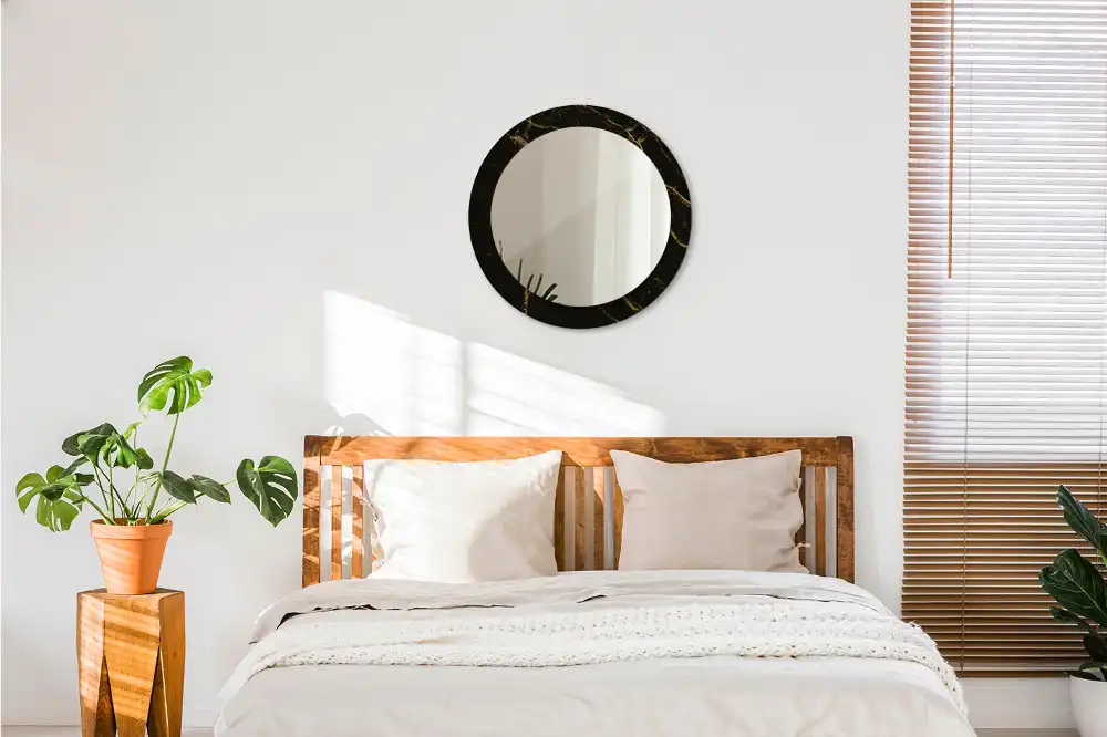 Miroir rond avec décoration marbrure noire
