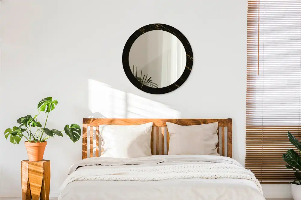 Miroir rond avec décoration marbrure noire