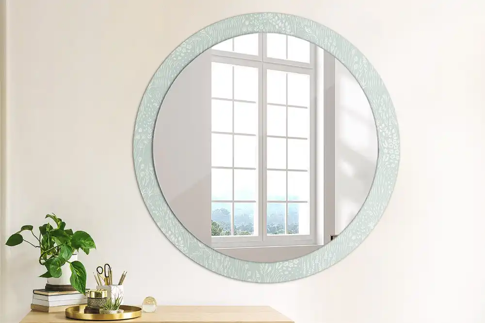 Miroir rond avec décoration escargot dans la prairie