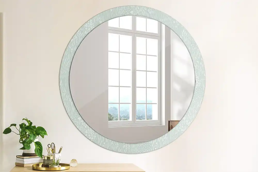 Miroir rond avec décoration escargot dans la prairie