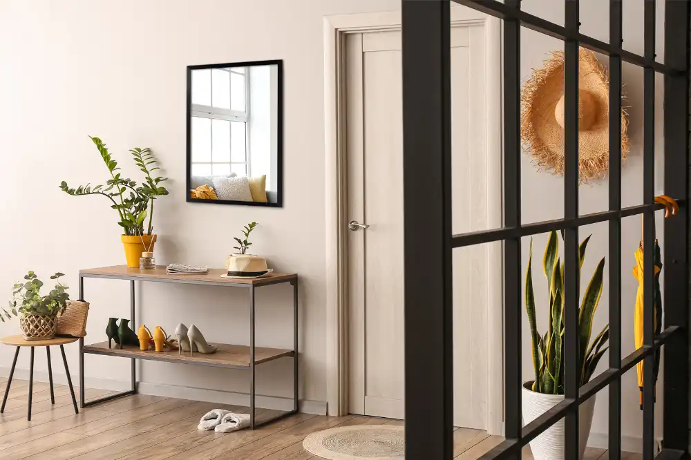 Miroir rectangulaire avec cadre noir suspendu