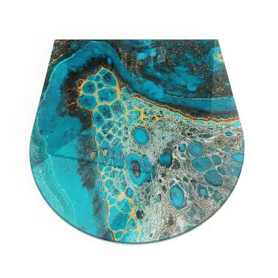 Plaque de sol semi-ovale pour cheminée aux motifs organiques abstraits