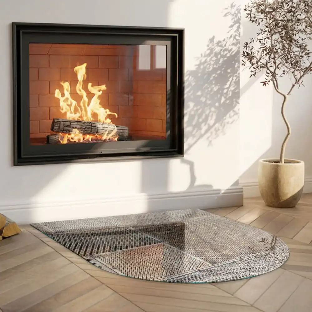 Plaque de sol semi-ovale en verre pour cheminée avec motif de feuille perforée