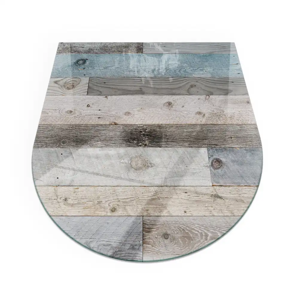 Plaque de sol semi-ovale en verre pour cheminée disponible en plusieurs teintes