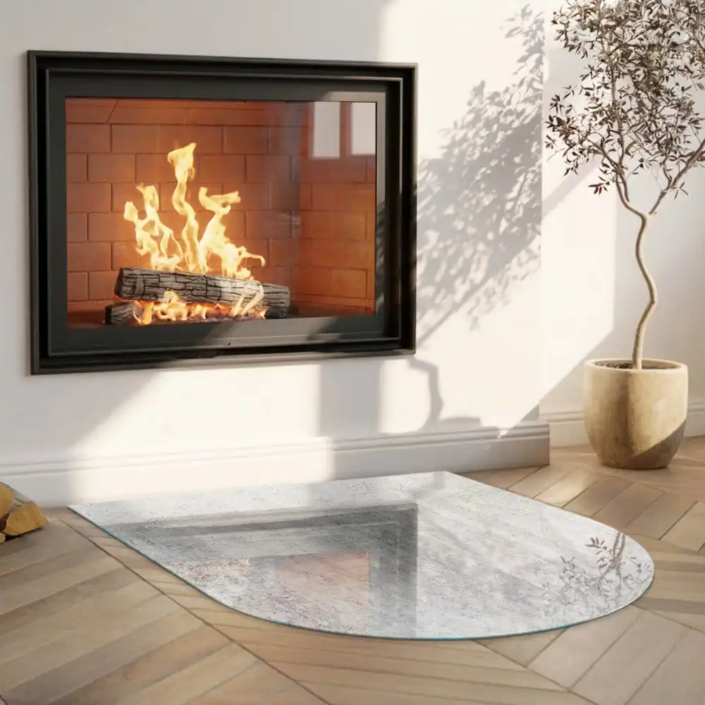 Plaque de sol semi-ovale pour poêle à bois en verre aspect béton brut