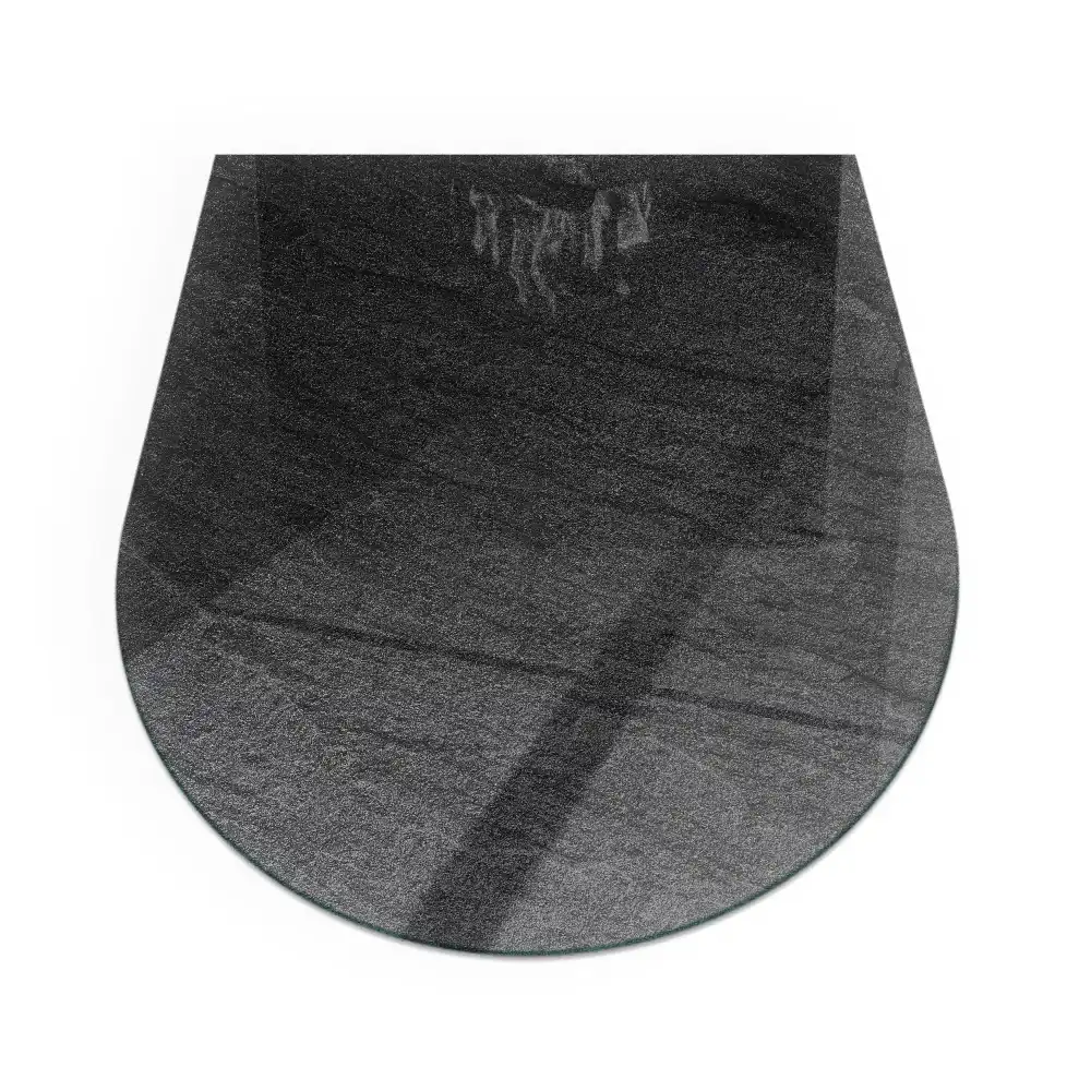 Plaque de sol semi-ovale en verre pour cheminée avec texture effet pierre