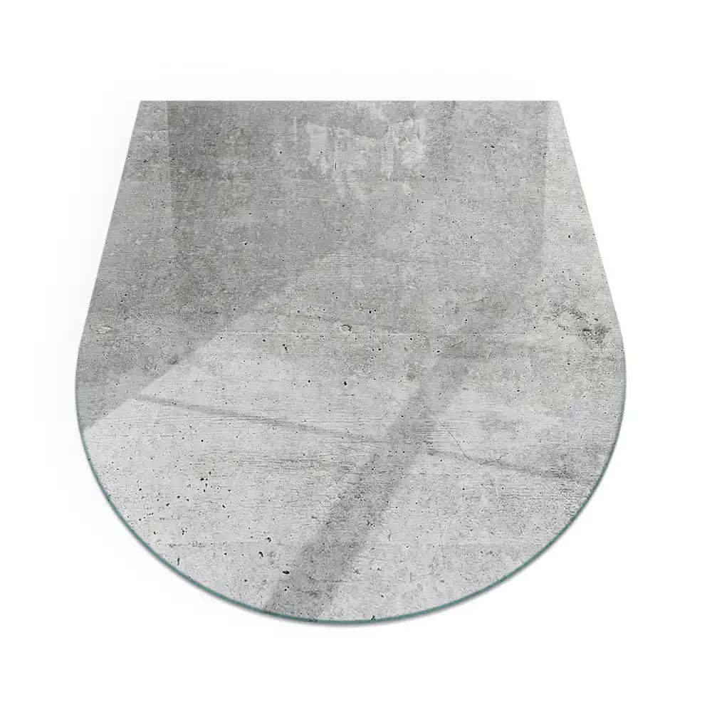 Plaque de sol semi-ovale en verre trempé pour poêle avec texture béton brut