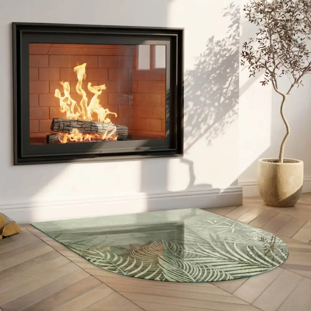 Plaque de sol semi-ovale en verre trempé pour cheminée motif feuilles tropicales