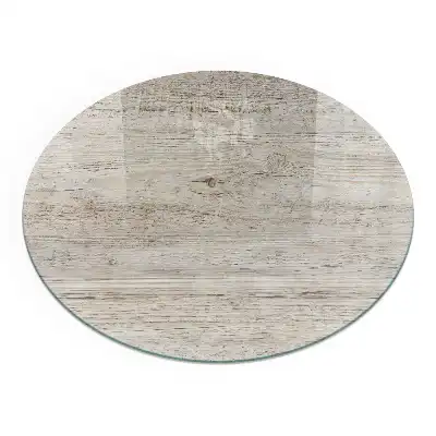 Plaque de sol ronde en verre pour cheminée aspect bois clair