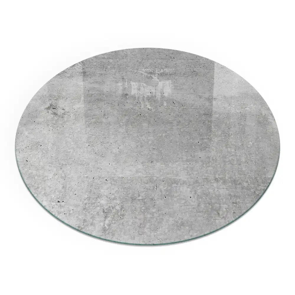 Plaque de sol ronde pour cheminée aspect béton brut