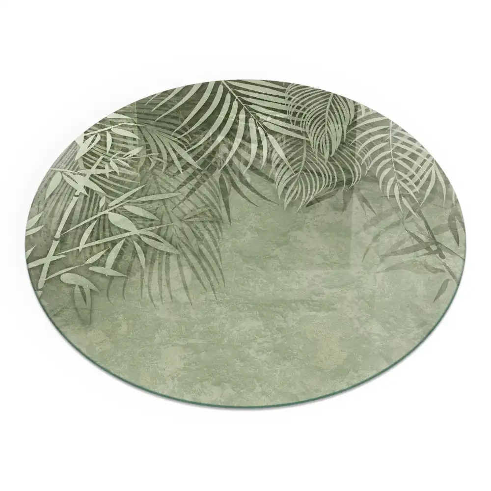 Plaque de sol ronde en verre pour cheminée avec motif de feuilles tropicales