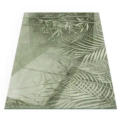 Plaque de sol rectangulaire en verre pour cheminée d'angle avec motif feuilles tropicales