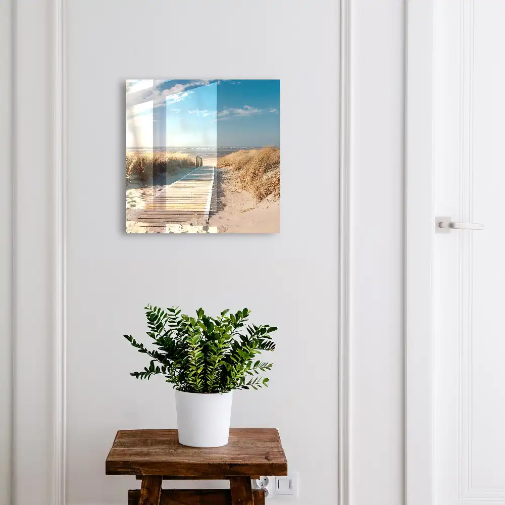 Boîte à clés un chemin sur la plage entouré de dunes et d'herbes