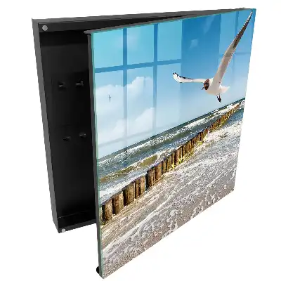 Boîte à clés murale des vagues sur la plage et une mouette