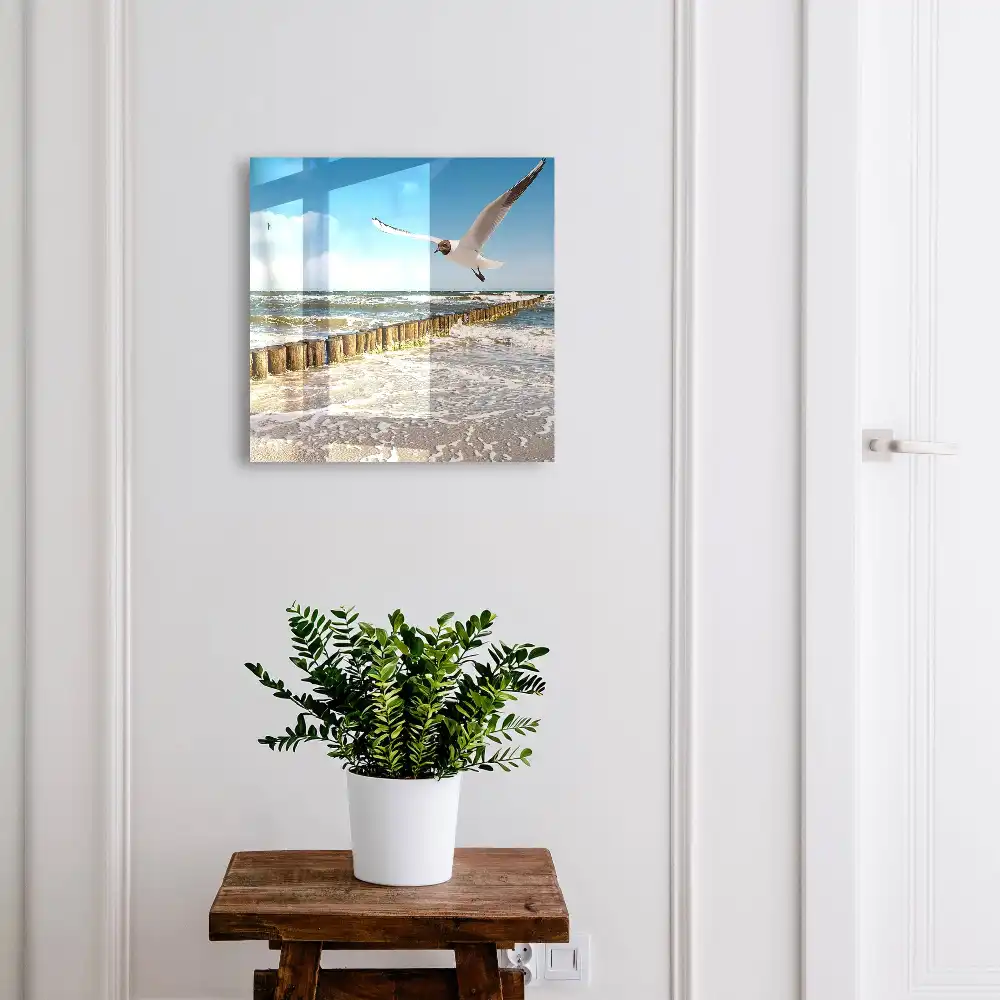 Boîte à clés murale des vagues sur la plage et une mouette
