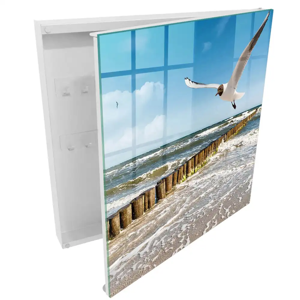 Boîte à clés murale des vagues sur la plage et une mouette