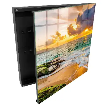Armoire à clés un coucher de soleil sur la mer aux couleurs chaudes
