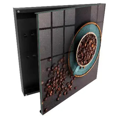 Boîte à clés une tasse avec des graines de pavot et une assiette turquoise